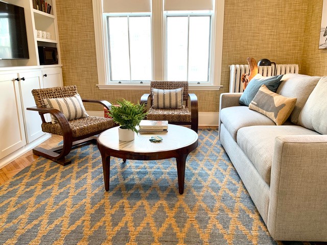 White living room with two chair and table